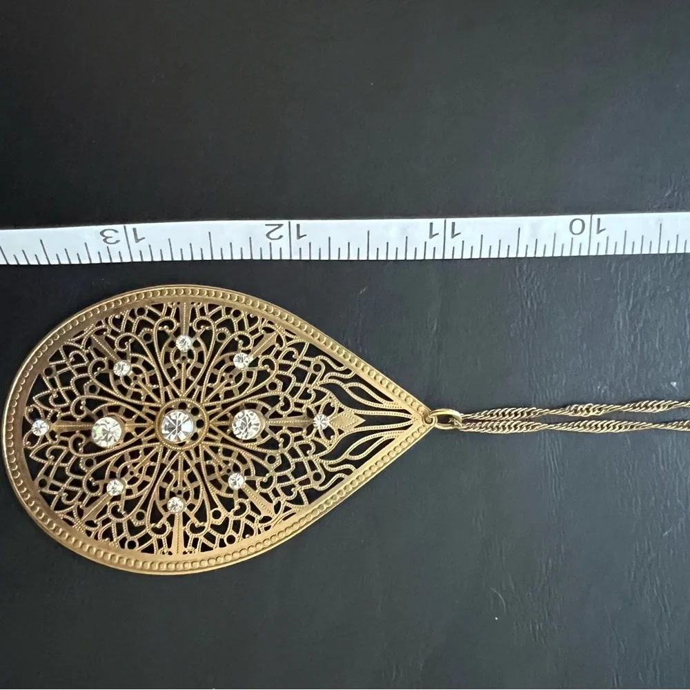 NECKLACE of GOLD TONE FILIGREE WITH RHINESTONES A TWISTED CHAIN AND EXTENSION